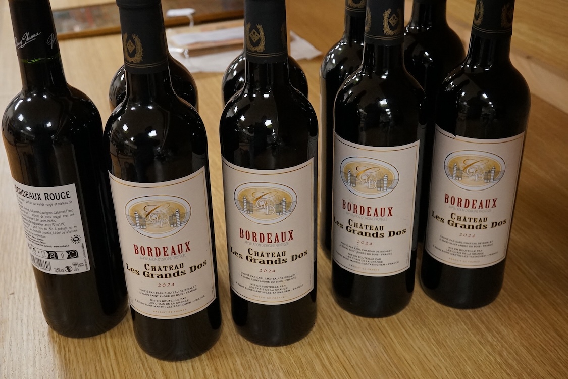 Eight bottles of Chateau Les Grands 2024, and a bottle of Bordeaux 2022